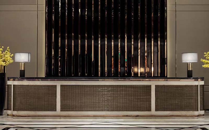 A case study of veneer decoration on front desk of Hotel